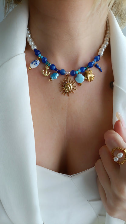site de bijoux français, collier à breloques bleu, collier à charms bleu, collier à pendentif bleu, collier en perles bleues et breloques bleu pas cher, site de colliers à breloques pas cher, site de collier à charms pas cher, collier femme en perles bleu et breloques, bijoux printemps été 2026, site de bijoux français pas chers, bijoux été 2026 pas cher, collier acier femme frnataisie, site de bijoux en acier pas cher, ite de bijoux tendance pas chers français