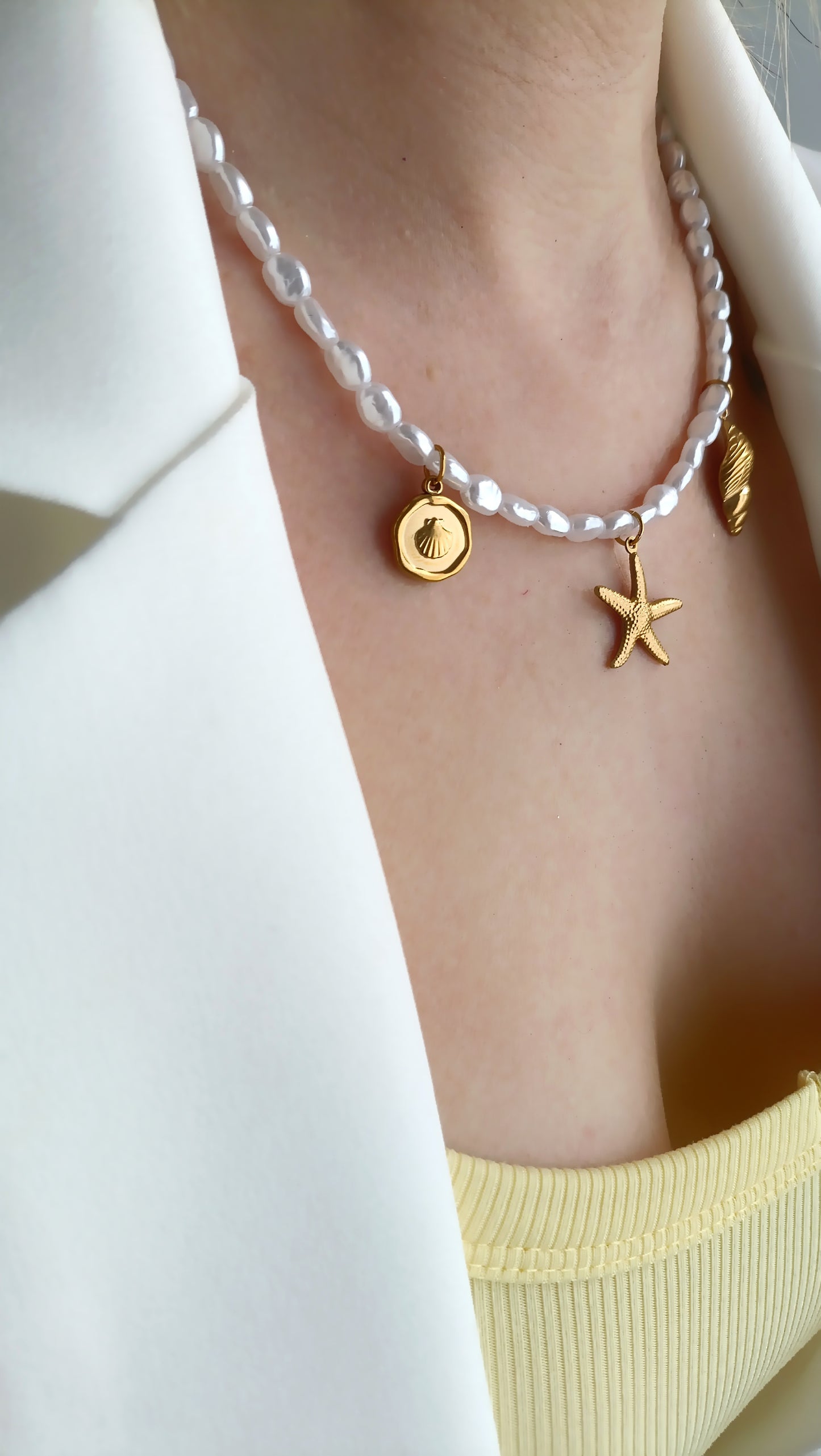 Collier femme en perles et pendentifs coquillage, collier femme coquillages pas cher, bijoux femme printemps été 2026 pas cher, bijoux femme printemps été 2026 originaux, collier femme pendentifs coquillage, collier femme en perles et pendentifs coquillages, collier femme en perles et charms coquillages