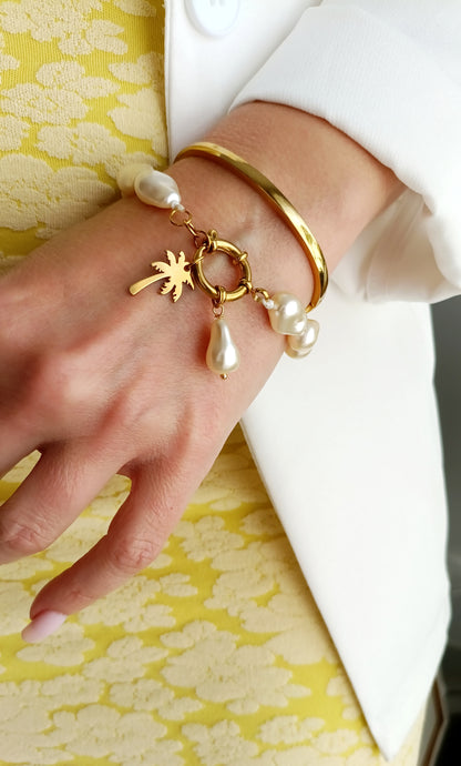 Bracelet femme en perles nacrées, bijoux femme en acier inox, bracelet femme en acier inox pas cher, bijoux artisaaux français, bijoux de créateurs français, bijoux fantaisie hypoallergéniques, bijoux artisanaux français abordables, bijoux fantaisie hypoallergéniques, bracelet femme grosses perles, site de bijoux fantaisie en acier inox pas cher, site de bijoux faits en france, bracelet femme grosses perles, bracelet femme à charms