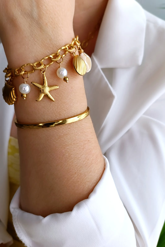Bracelet femme en perles nacrées, bijoux femme en acier inox, bracelet femme en acier inox pas cher, bijoux artisaux français, bijoux de créateurs français, bijoux fantaisie hypoallergéniques, bijoux artisanaux français abordables, bijoux fantaisie hypoallergéniques, bracelet femme grosses perles, site de bijoux fantaisie en acier inox pas cher, site de bijoux faits en france, bijoux de main en acier, bijoux de main fantaisie en acier et nacre