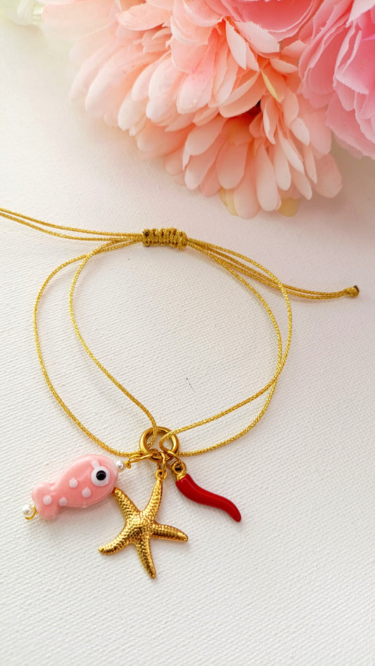 bracelet à charm acier inox, bijoux de créateur français pas cher, bijoux artisanaux français, bracelet à pendentifs, bracelet femme cordon, bracelet femme acier inox pas cher, bijoux fantaisie en acier inxo pas cher, site de bijoux de créateur français, 