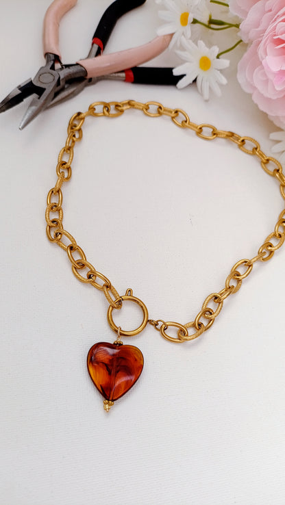 collier de créateur rodez, bijoux fantaisie rodez, bijoux de créateur rodez, bijoux acier inox rodez, bijoux faits main rodez, collier acier inox et coeur ambre pas cher, bijoux fantaisie pas cher rodez, collier grosse maille pendentif coeur ambre, collier marron, collier pendentif coeur ambre